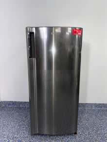 Adjustable glass shelving inside LG LRONC0605V compact refrigerator, available as a scratch and dent deal in Kansas City.