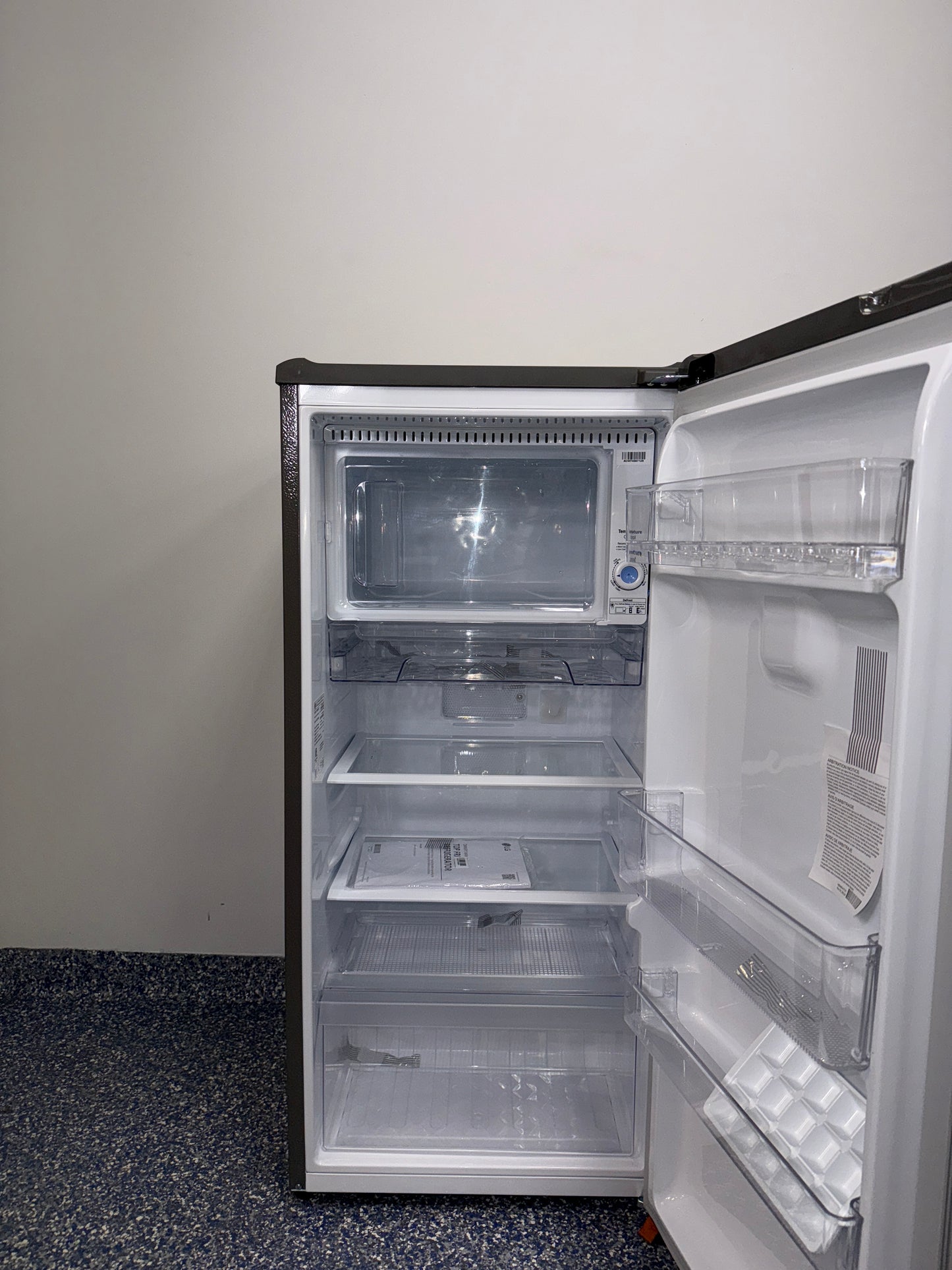 Interior of LG LRONC0605V compact refrigerator showing 5.8 cu. ft. capacity, available as a scratch and dent deal in Kansas City.