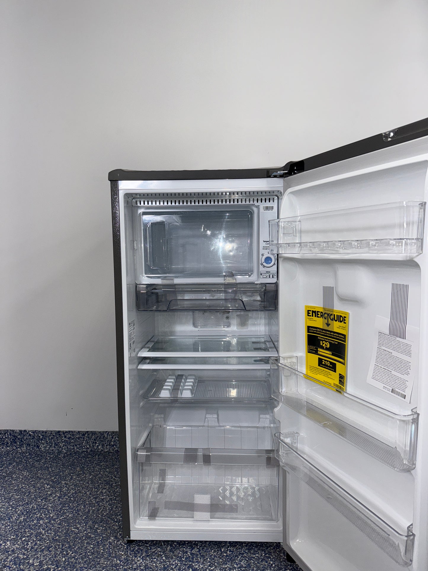 Counter-depth style of LG LRONC0605V mini refrigerator in platinum silver, offered at Appliance Shark in Kansas City.