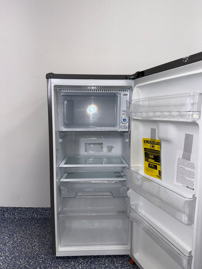 Interior of LG LRONC0605V mini fridge showing adjustable shelving, available as a scratch and dent deal in Kansas City.