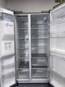 A close-up view of the exterior ice and water dispenser on the LG LS27T3230S, for sale in Kansas.