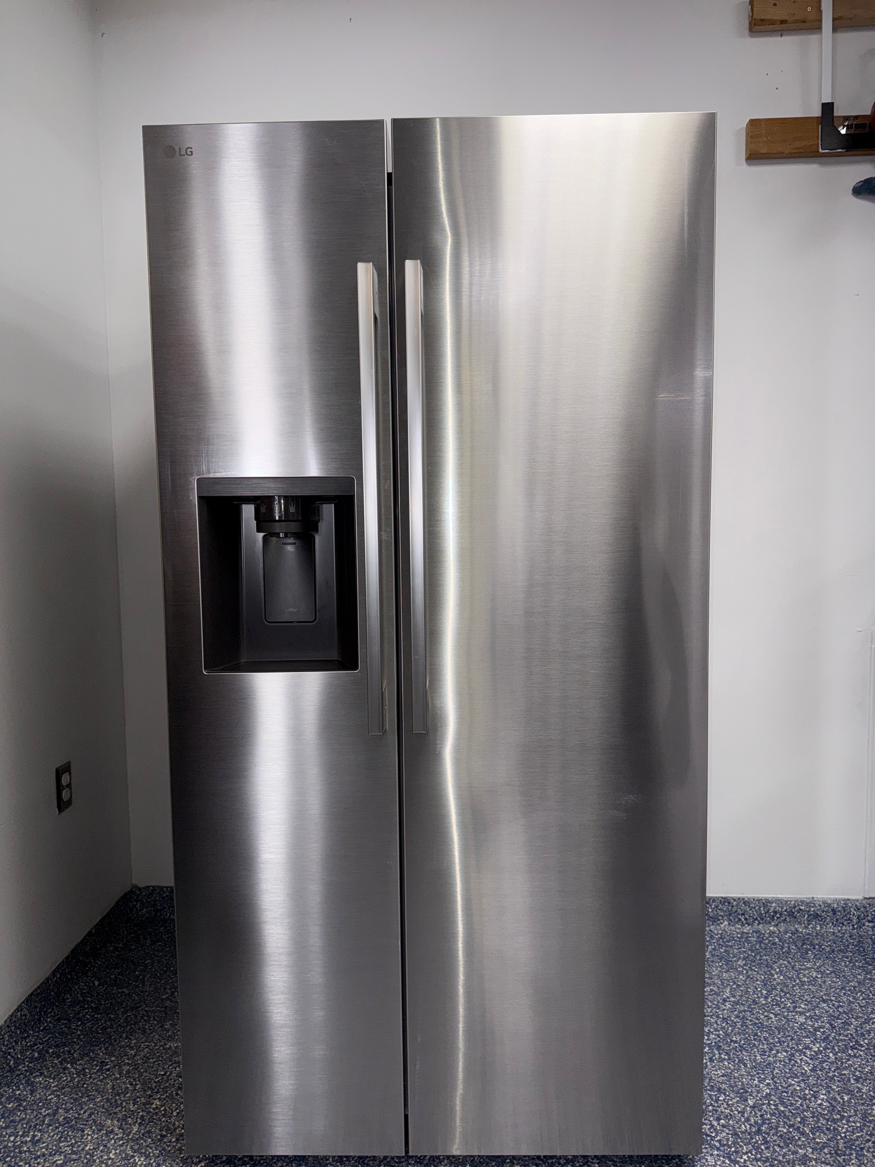The LG LS27T3230S refrigerator from the front, a side-by-side model for a great deal in Kansas.