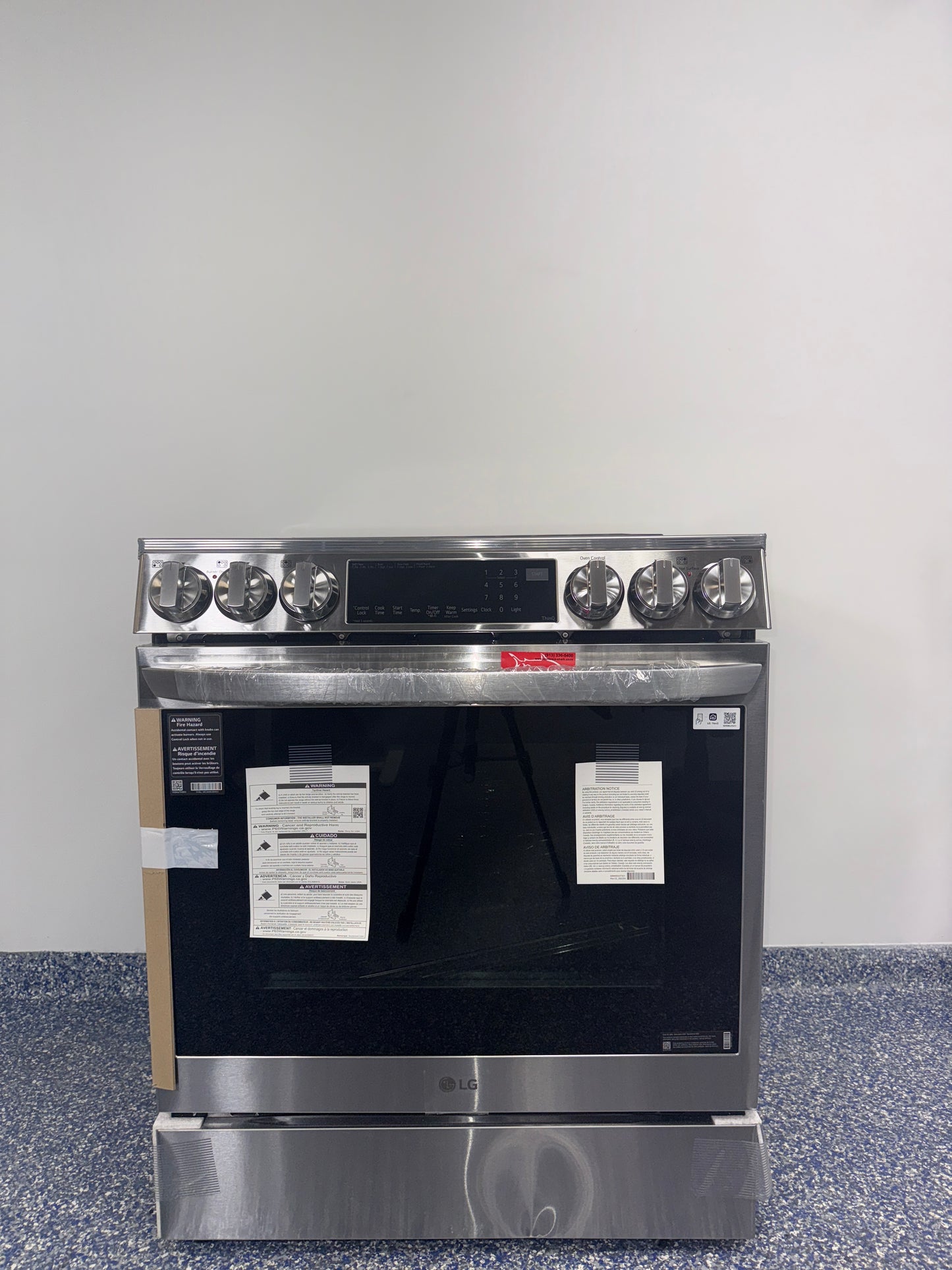 LG LSEL6335FE 6.3 cu. ft. stainless steel electric range with Air Fry, scratch and dent special at Appliance Shark in Kansas City.