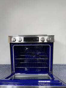 Cooktop view of LG LSIL6334FE induction range with 4 powerful elements, discounted at Appliance Shark in Kansas City.