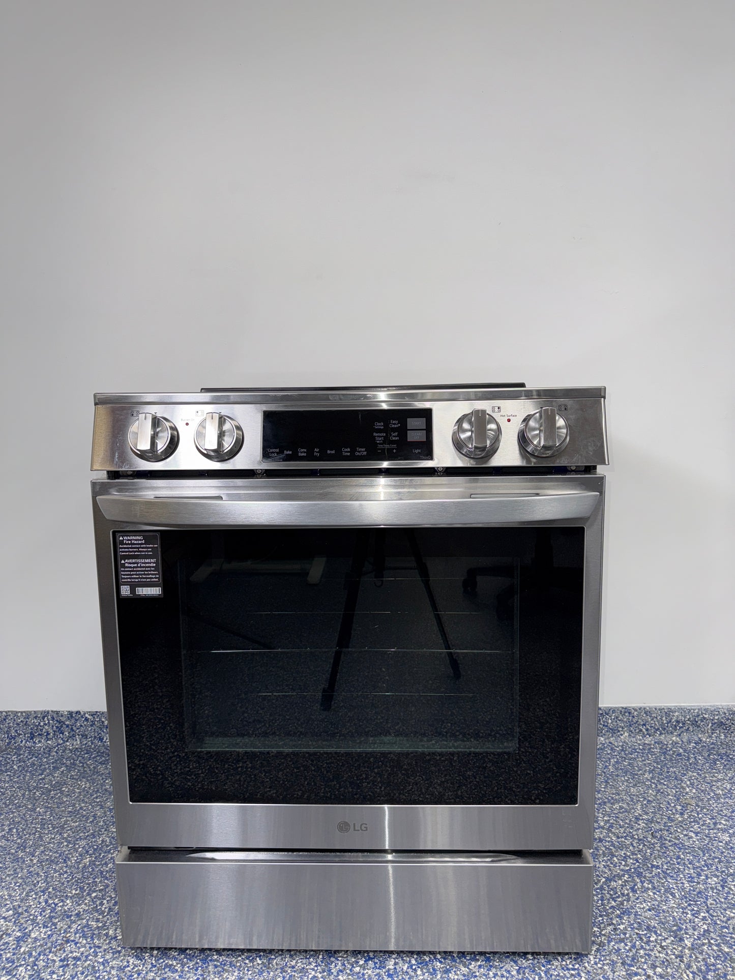 Front view of the LG LSIL6334FE 6.3 cu ft slide-in induction range in PrintProof® stainless steel, available in Overland Park, KS.