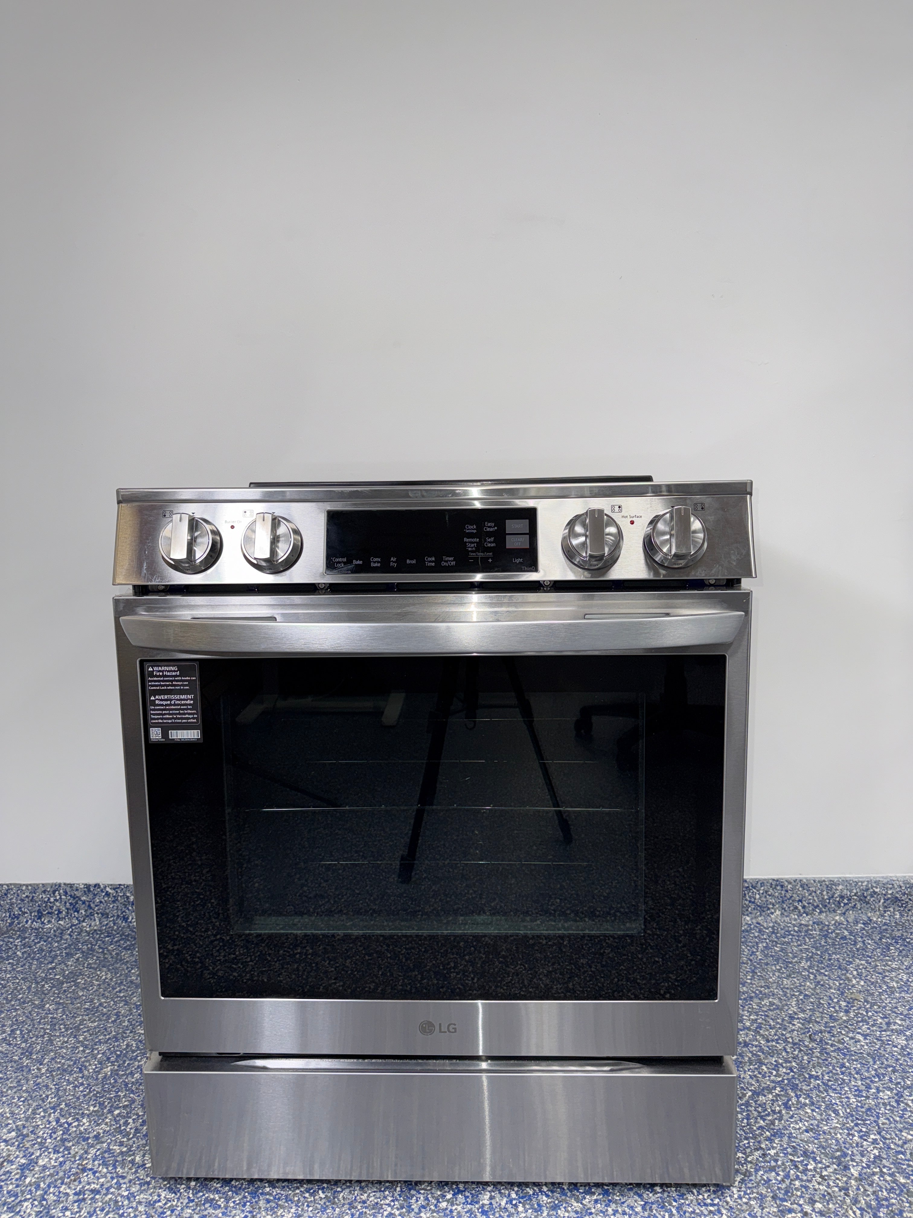 Front view of the LG LSIL6334FE 6.3 cu ft slide-in induction range in PrintProof® stainless steel, available in Overland Park, KS.