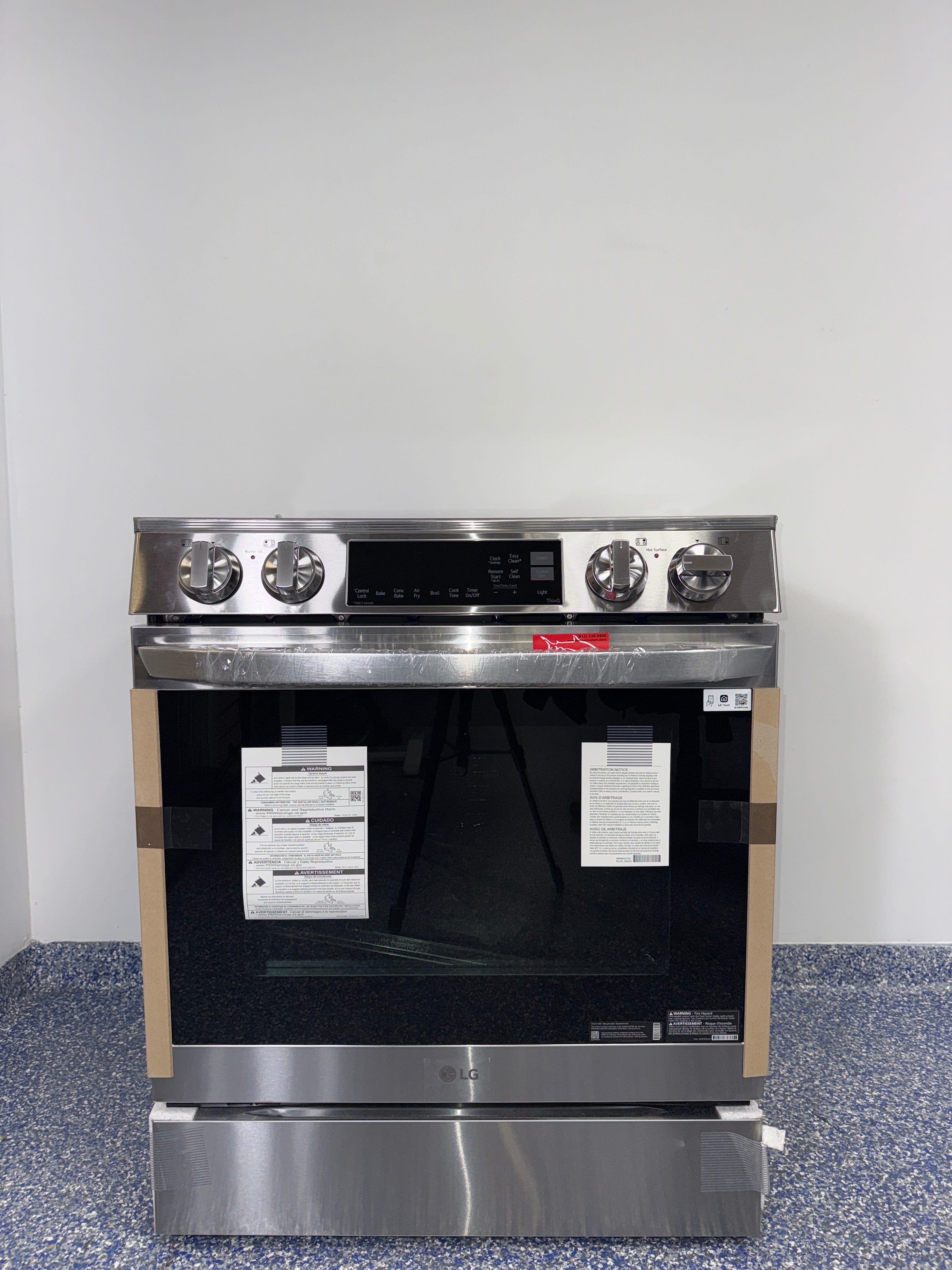 LG LSIL6334FE stainless steel induction range scratch and dent special at Appliance Shark in Kansas City.