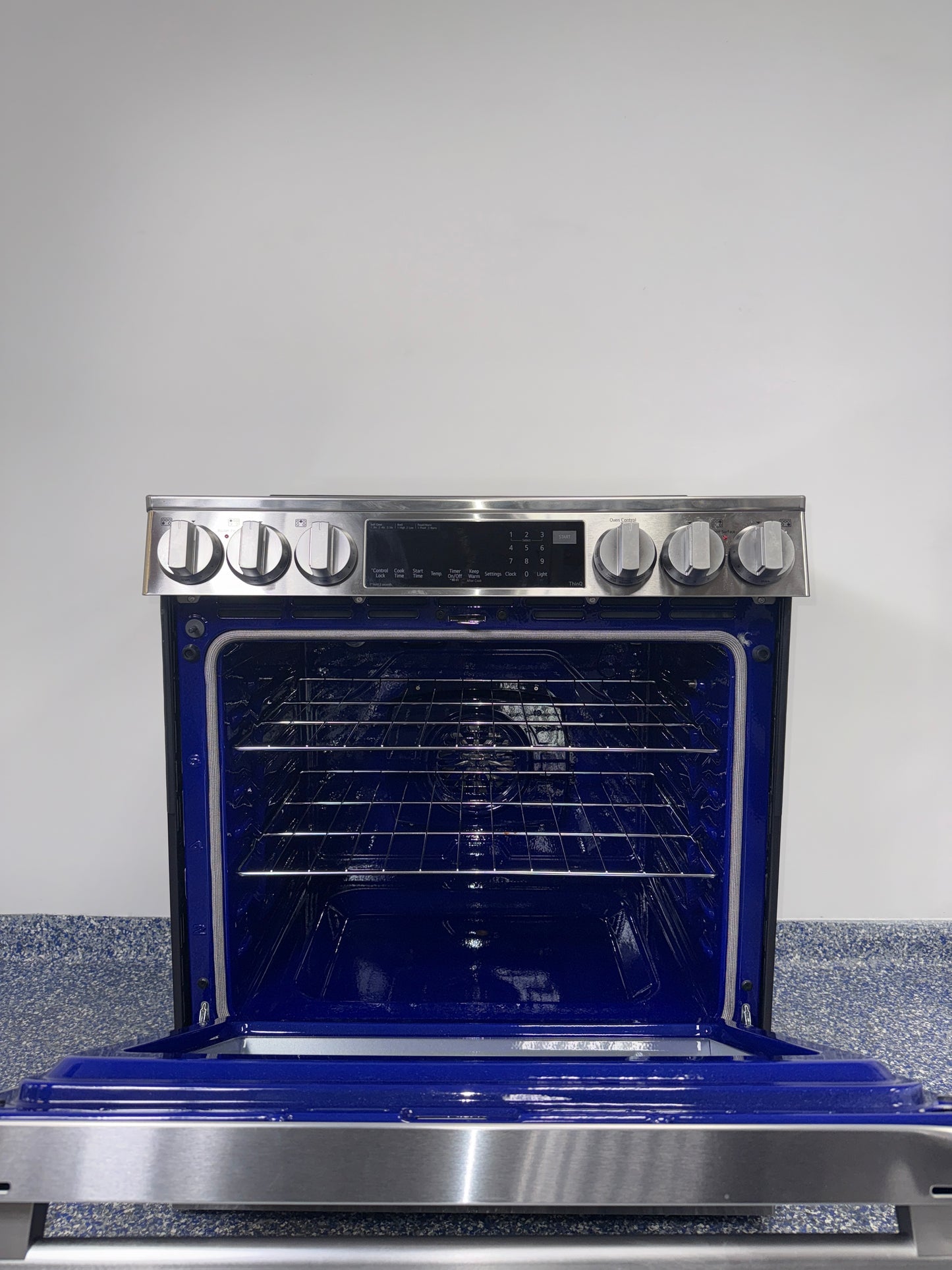 InstaView® knock-to-light oven window on LG LSIL6336XE induction range, offered as a scratch and dent deal in Kansas City.
