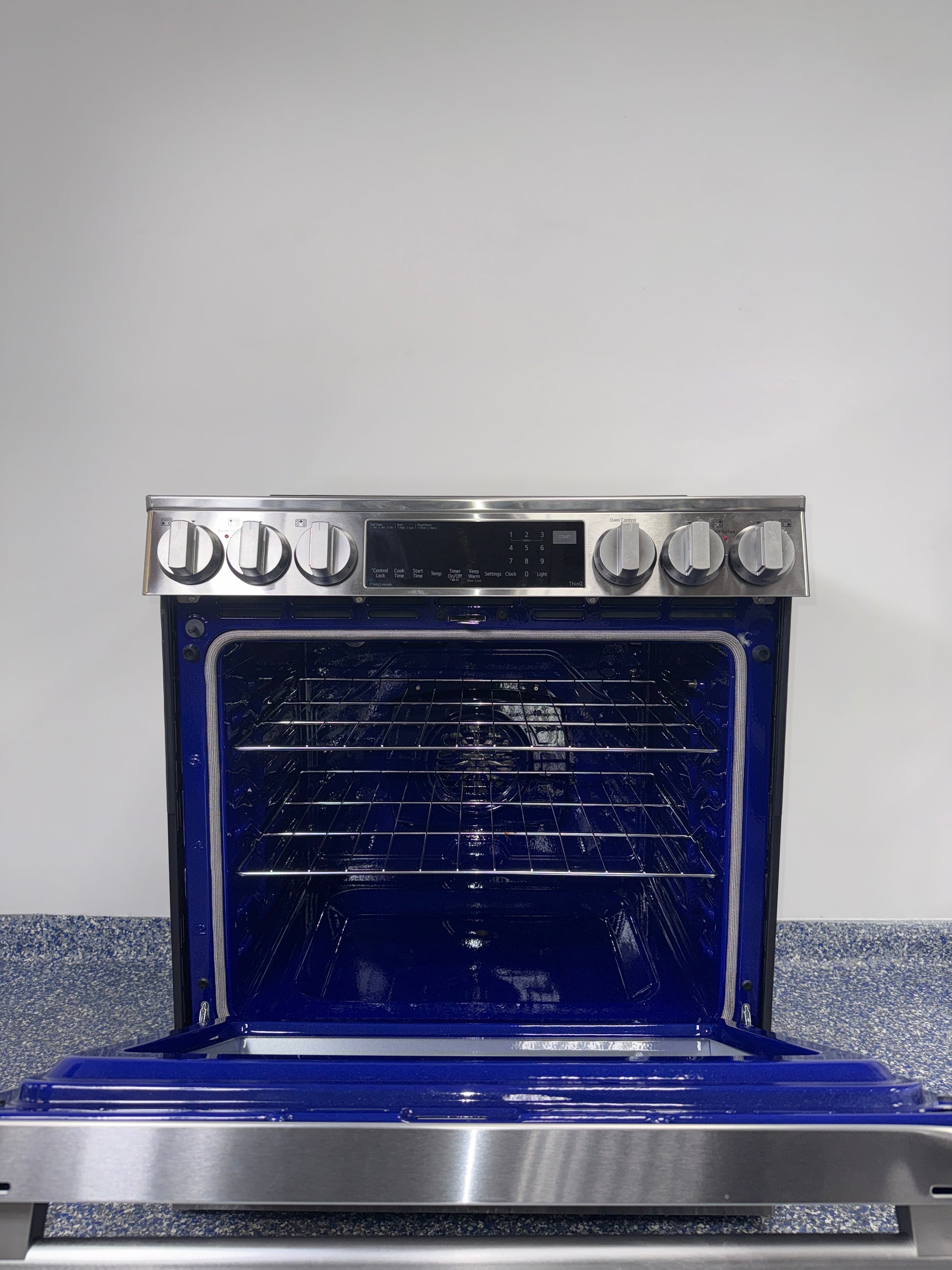 InstaView® knock-to-light oven window on LG LSIL6336XE induction range, offered as a scratch and dent deal in Kansas City.