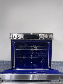 InstaView® knock-to-light oven window on LG LSIL6336XE induction range, offered as a scratch and dent deal in Kansas City.