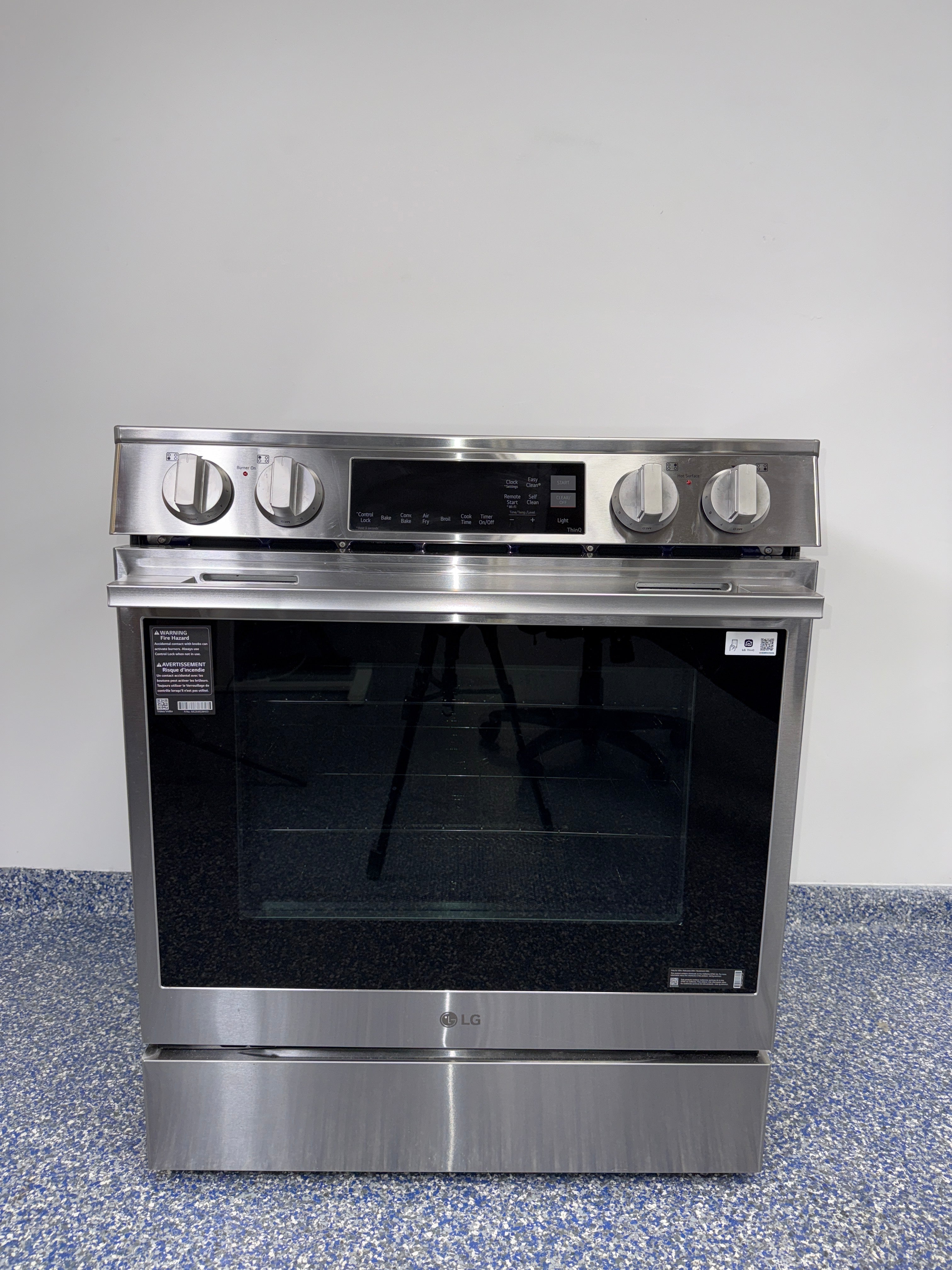 Sleek slide-in design of LG LSIL6336XE induction range, discounted at Appliance Shark in Kansas City.