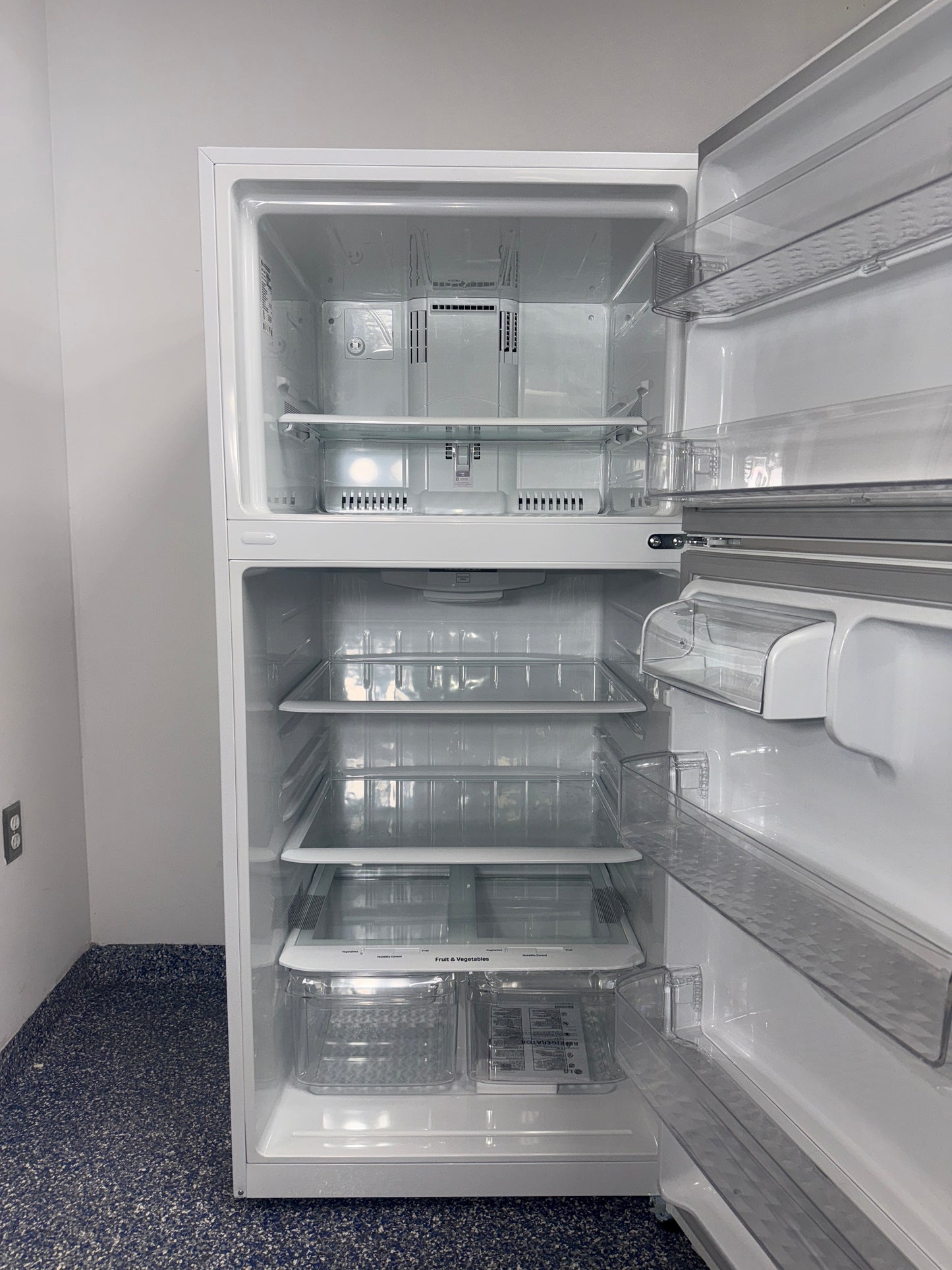 A close-up view of the Multi-Air Flow cooling system inside the LG LTCS20020W refrigerator, for sale in Kansas.