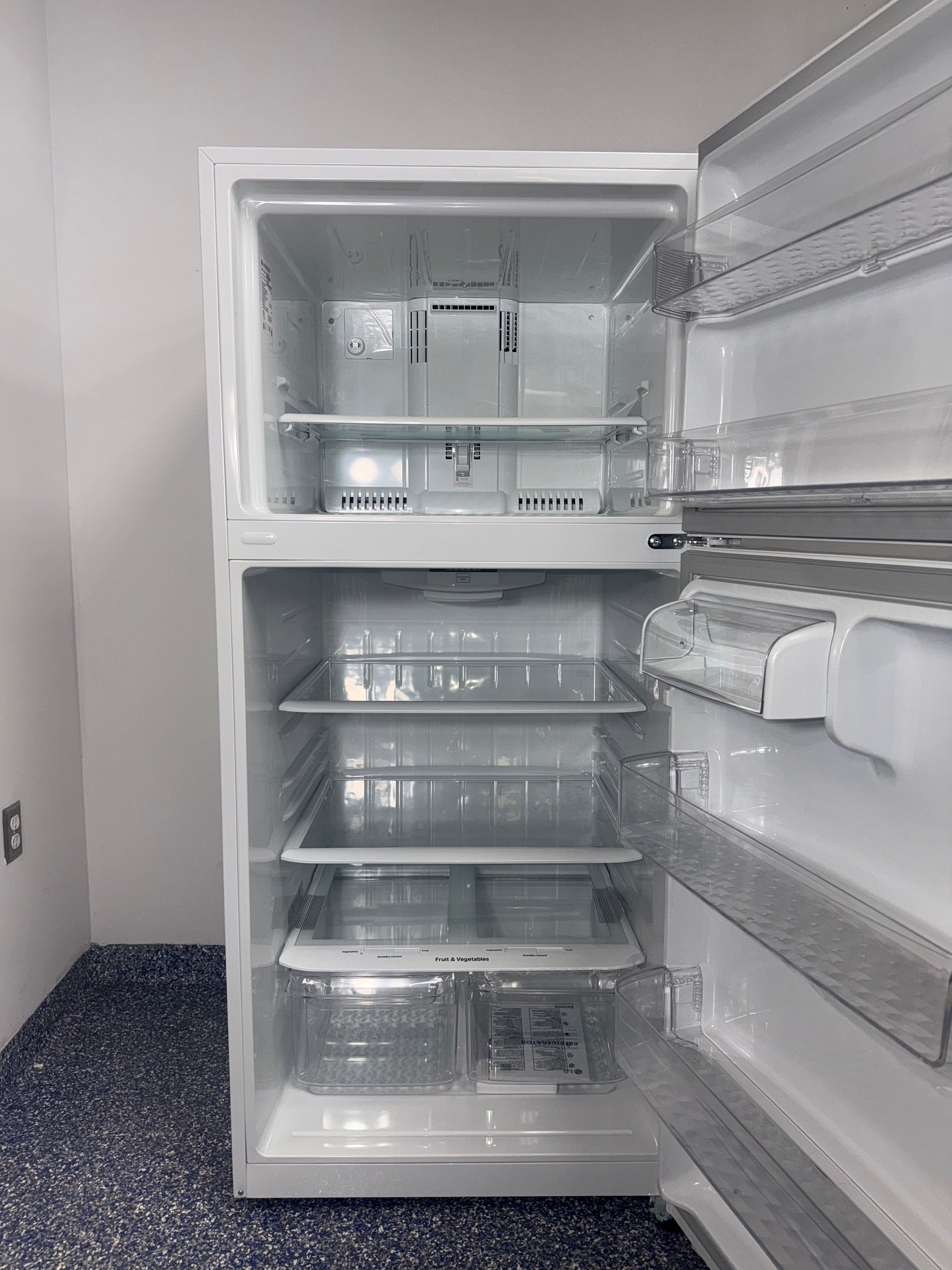A close-up view of the Multi-Air Flow cooling system inside the LG LTCS20020W refrigerator, for sale in Kansas.