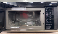 Scratch & dent LG MVEL2137F microwave displayed at Appliance Shark in Overland Park with smart Wi-Fi connectivity.