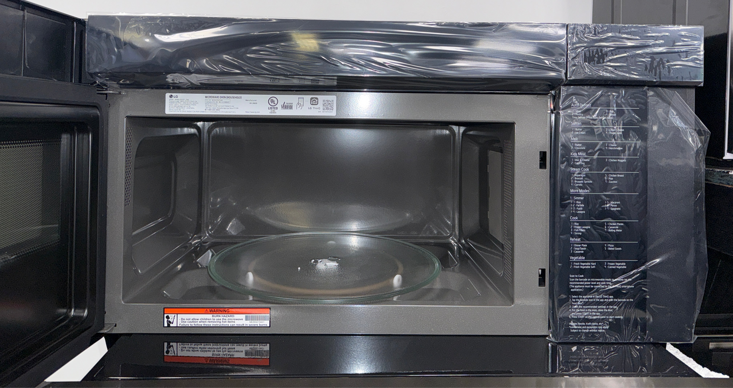 The LG over-the-range microwave with its glass controls and Sensor Cooking technology, an ideal appliance for homes in Overland Park.