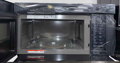 The LG over-the-range microwave with its glass controls and Sensor Cooking technology, an ideal appliance for homes in Overland Park.