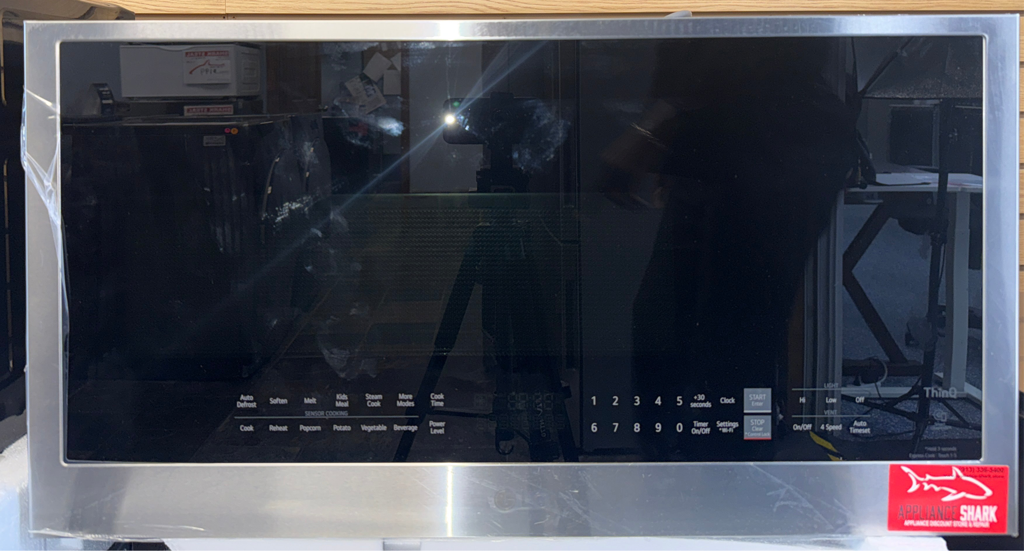 LG MVEL2033F over-the-range microwave front view available in Overland Park Kansas City metro area.