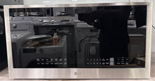 LG MVEL2033F 2.0 cu. ft. over-the-range microwave in stainless steel, scratch and dent special at Appliance Shark in Kansas City.