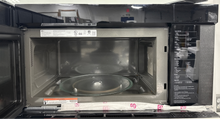 Modern stainless steel design of LG MVEL2033F microwave, discounted at Appliance Shark in Kansas City.