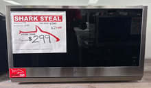 LG MVEL2137F smart over-the-range microwave in stainless steel, available at Appliance Shark as the best scratch and dent microwave deal in Kansas City.