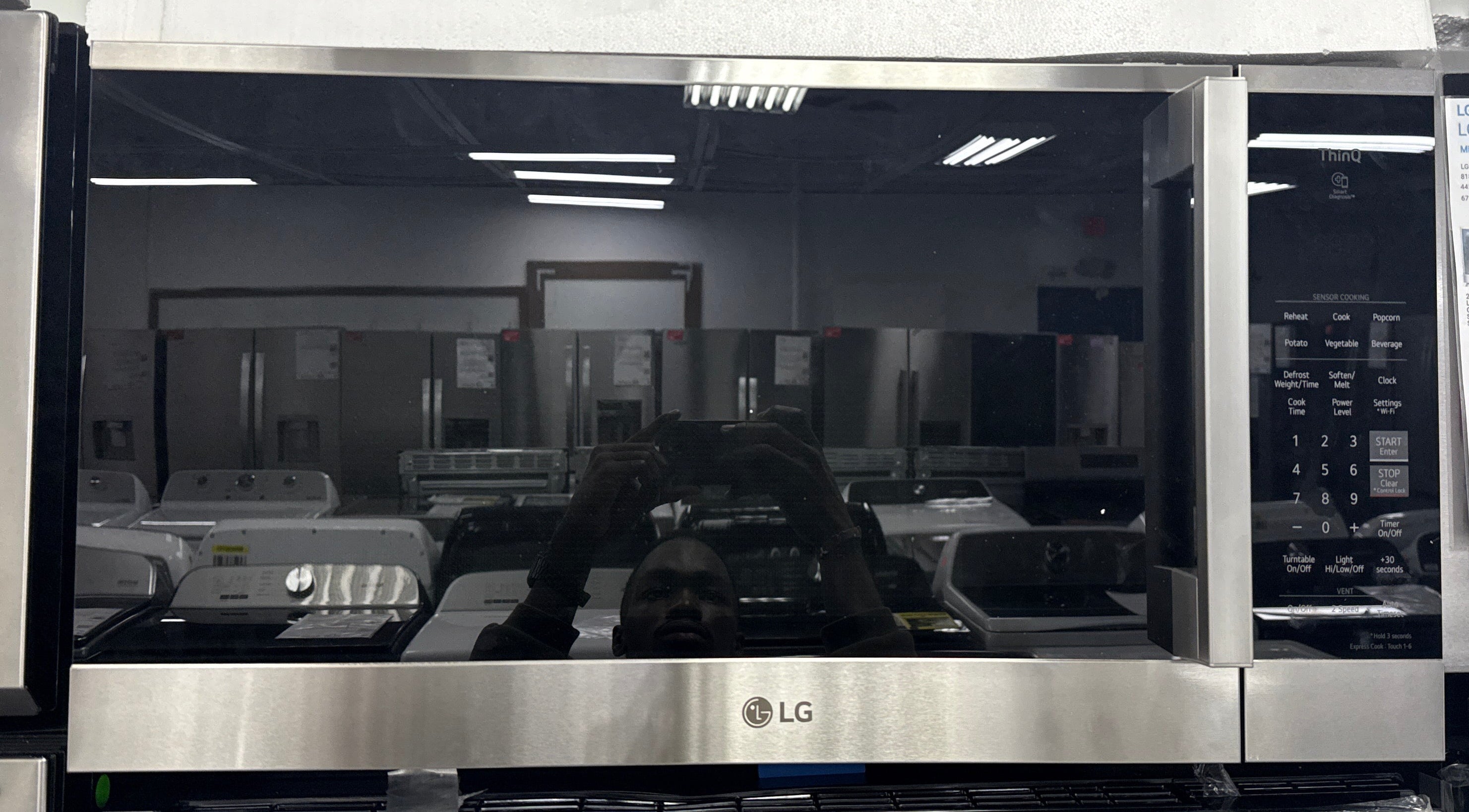 LG MVEM1825X front view PrintProof® stainless microwave Kansas City kitchen