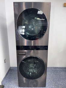 A close-up view of the drum interiors on the LG WKEX200HBA, showing the TurboWash™ 360° and TurboSteam™ features, perfect for an Overland Park, KS home.