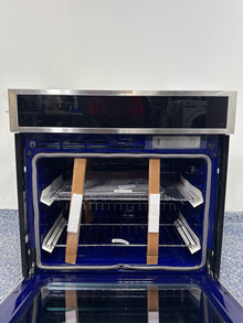 Scratch & dent LG WSEP4727F wall oven displayed at Appliance Shark in Overland Park with sleek stainless design.