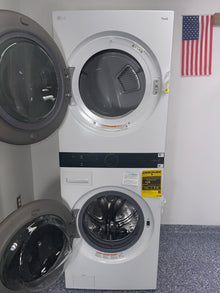 Center Control® panel of the LG WKE100HWA for convenient reach, shown in Kansas City homes.