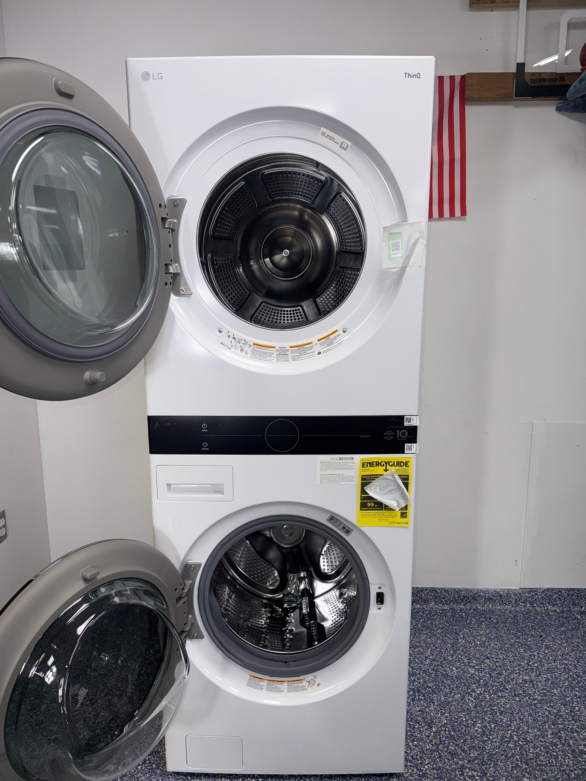 Detail of the ventless heat-pump dryer on the LG WKHC252HWA tower, shown in Kansas City homes.