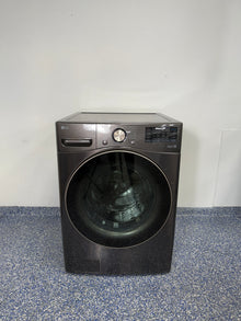A full frontal image of the LG WM4000HBA smart washing machine, showcasing its Black Steel finish and AI-enabled control panel. On sale at Appliance Shark - Scratch & Dent store | Kansas City.