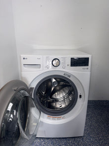 Control panel featuring TurboWash™ 360 and ThinQ® smart options on the LG WM4000HWA, shown in Kansas City homes.