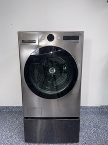 The LG WM5500HVA front load washer from the front, highlighting its TurboWash™ 360° feature and a great deal in Kansas.