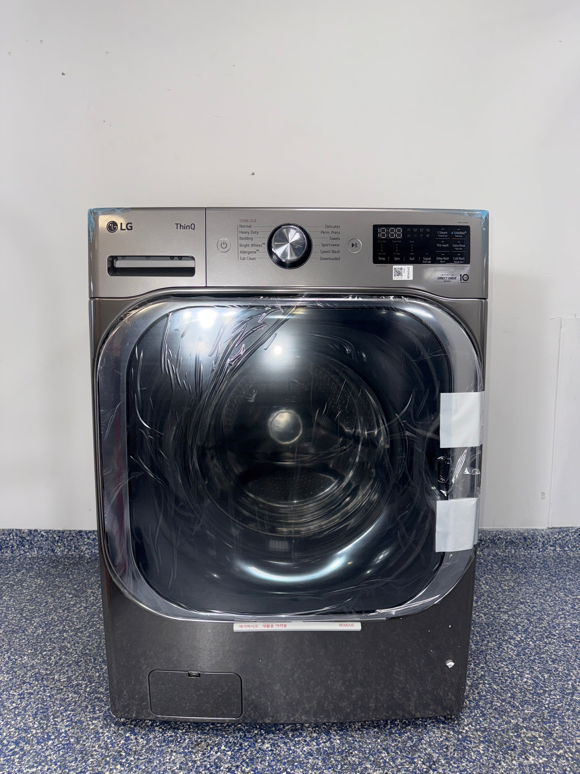 Front view of the LG WM8980HVA 5.2 cu ft front-load washer in Graphite Steel, available in Overland Park, KS.