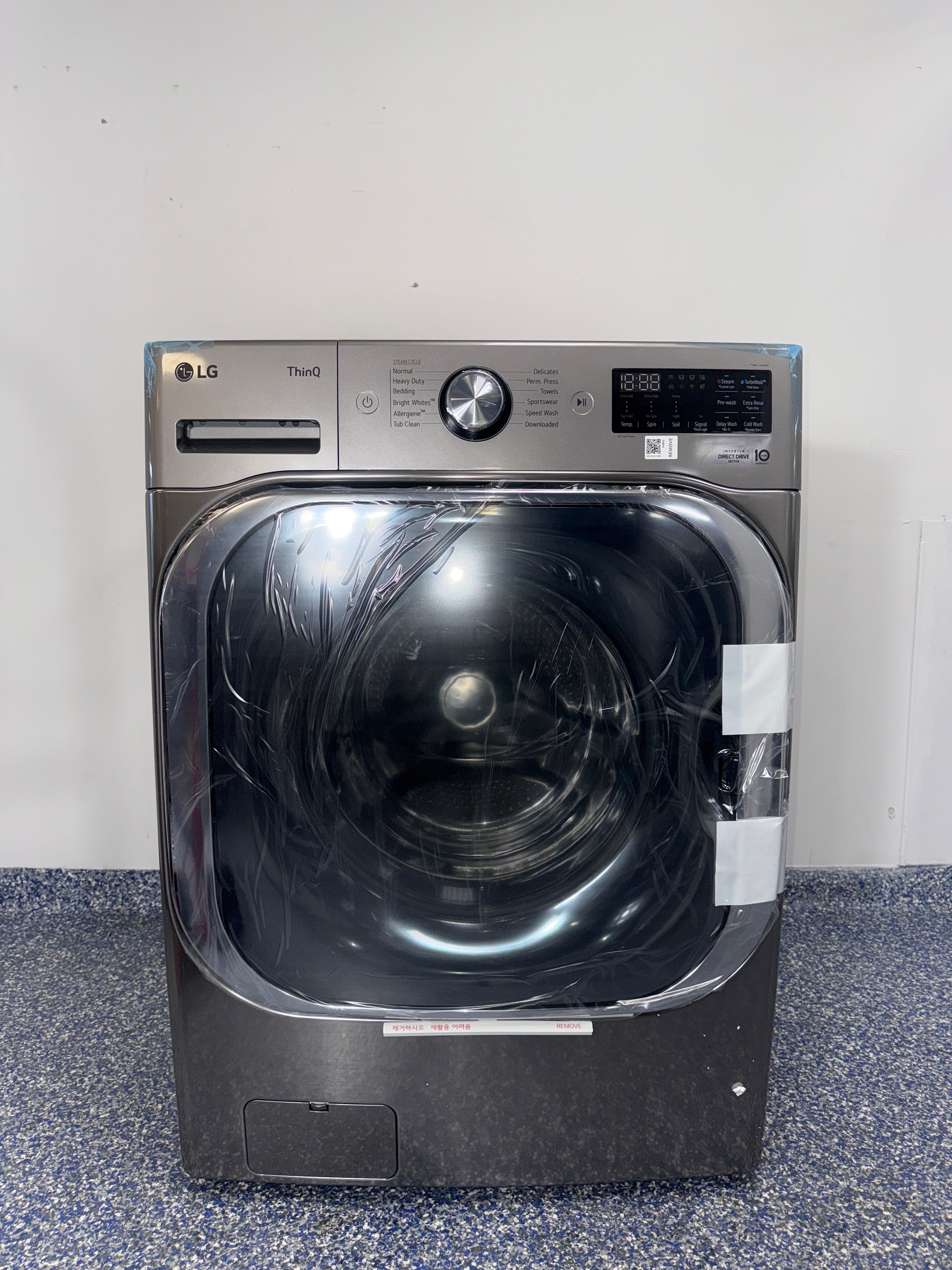 Front view of the LG WM8980HVA 5.2 cu ft front-load washer in Graphite Steel, available in Overland Park, KS.