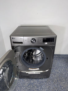 Control panel of LG WM8980HVA front load washer in an Overland Park home.