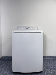 The interior of the LG WT6105CW washer, showcasing its durable stainless steel drum, for sale in Kansas.