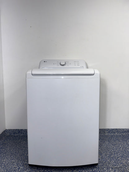 The interior of the LG WT6105CW washer, showcasing its durable stainless steel drum, for sale in Kansas.