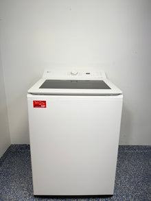 A frontal photo of the LG WT8200CW top-load washing machine, showcasing its sleek design and white finish.