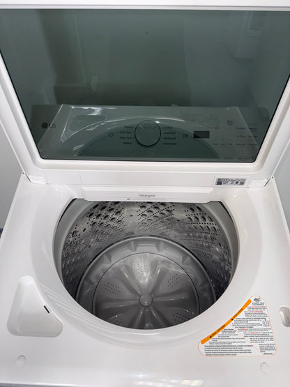 A front view of the LG WT8205CW washer, highlighting its durable stainless steel drum, ready for installation in a Kansas City laundry room.