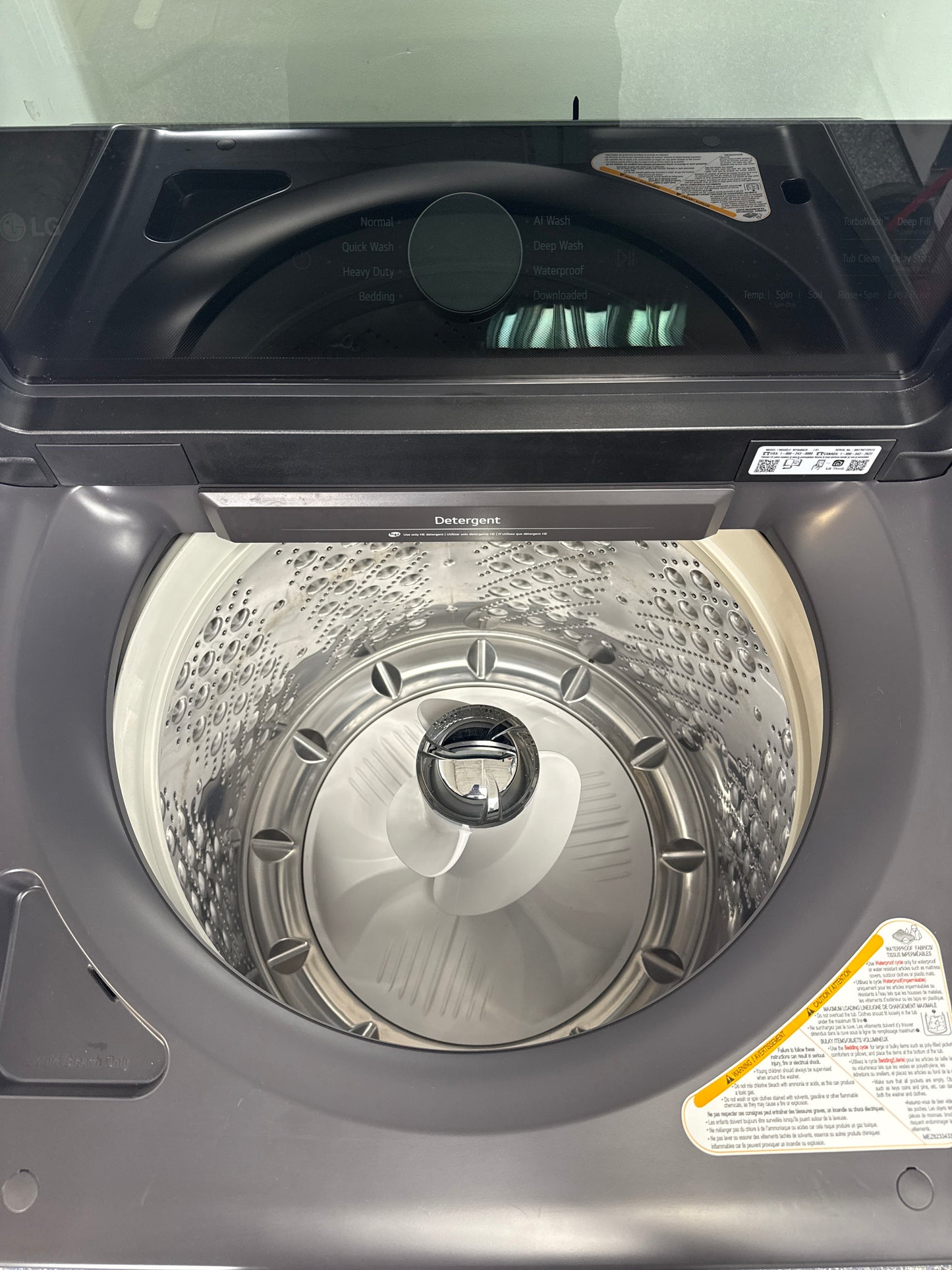 Interior drum of the LG WT8600CB 5.8 cu ft washer, ideal for large Kansas City households.