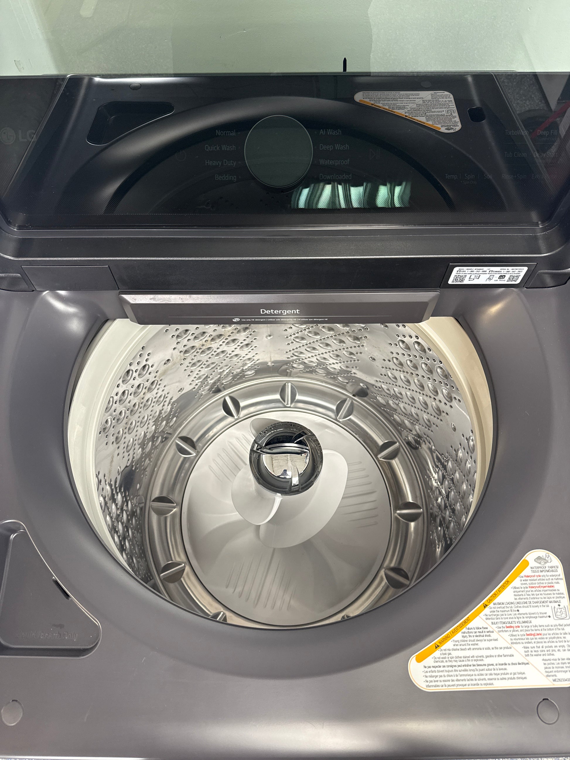 Interior drum of the LG WT8600CB 5.8 cu ft washer, ideal for large Kansas City households.