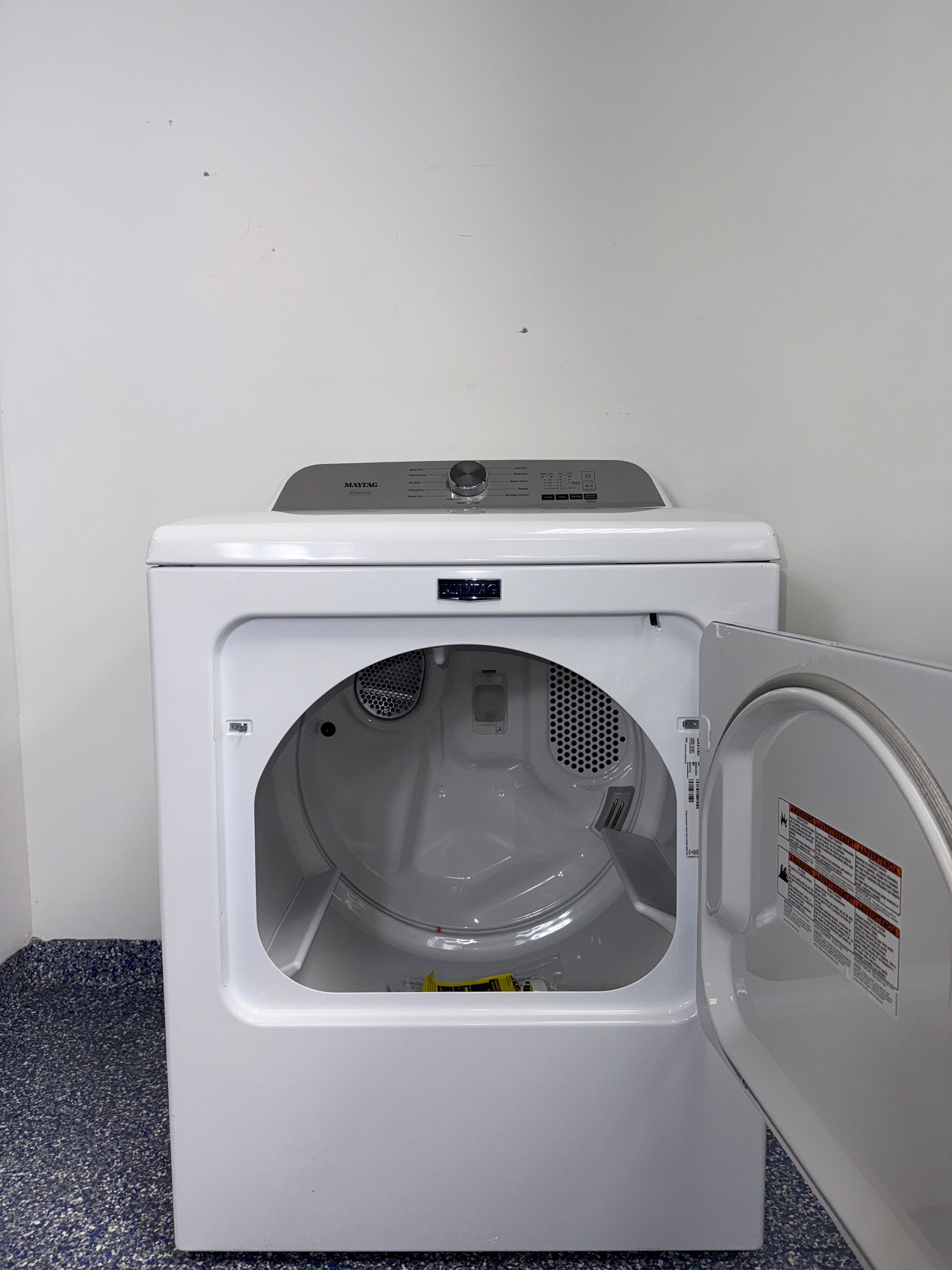 The interior of the MAYTAG MED6500MW dryer, showcasing its spacious 7.0 cu. ft. capacity, perfect for an Overland Park, KS home.