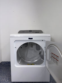 The interior of the MAYTAG MED6500MW dryer, showcasing its spacious 7.0 cu. ft. capacity, perfect for an Overland Park, KS home.