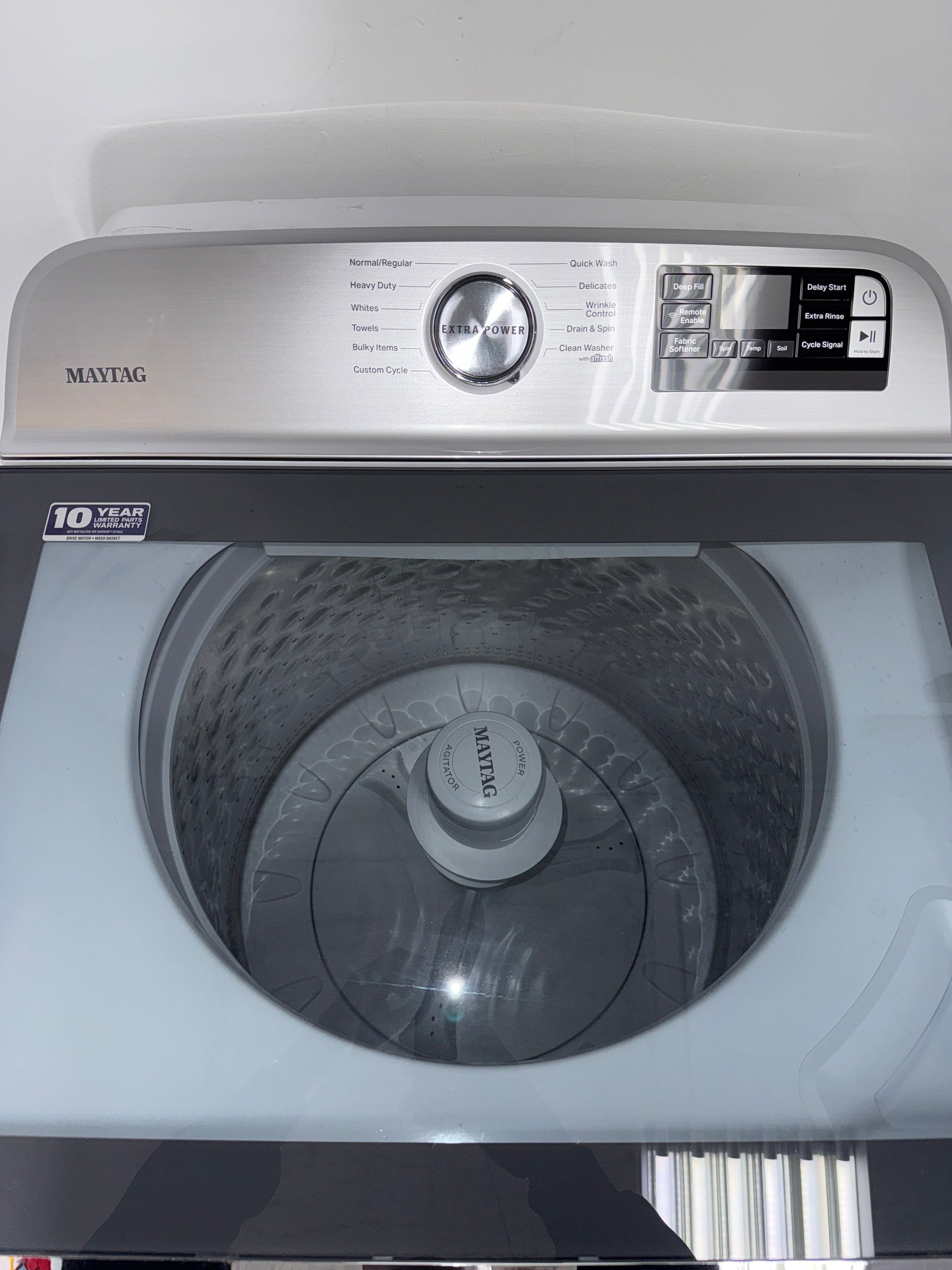 A close-up view of the control panel on the MAYTAG MVW6230HW washer, showcasing its Advanced Vibration Control, perfect for an Overland Park, KS home.