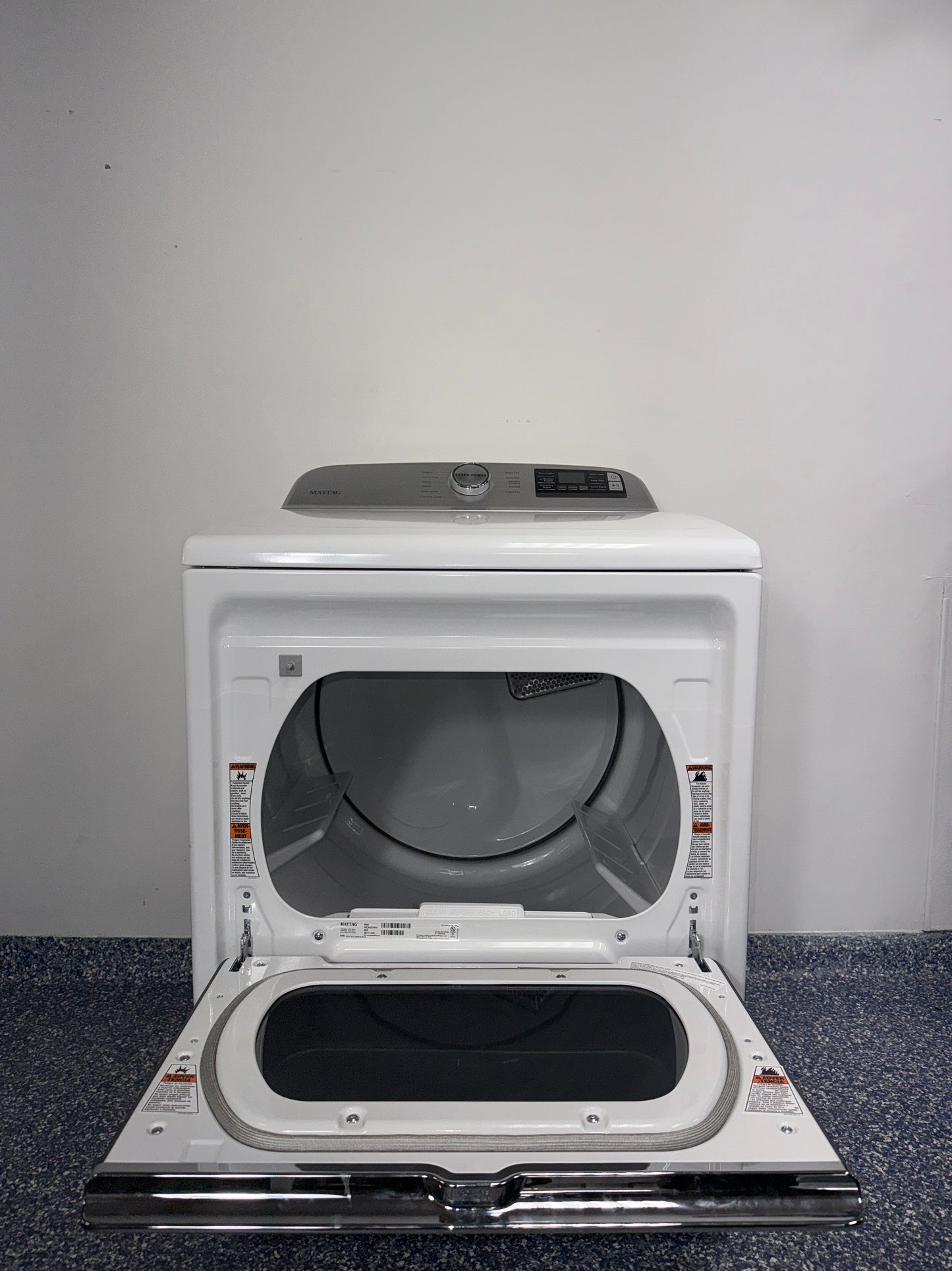 A view of the control panel on the MAYTAG MED6230HW dryer, showcasing the Wrinkle Prevent Option, an ideal appliance for homes in Overland Park.