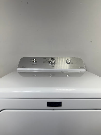 A detailed view of the simple electromechanical control knobs for the MAYTAG MED4500MW, showing the various cycles and temperature settings. On sale at Appliance Shark - Scratch & Dent store | Kansas City.