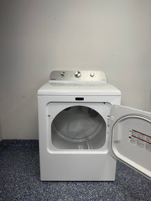 An overhead shot of the MAYTAG MED4500MW with the door open, showcasing the spacious drum interior and Auto Dry Control sensor. On sale at Appliance Shark - Scratch & Dent store | Kansas City.
