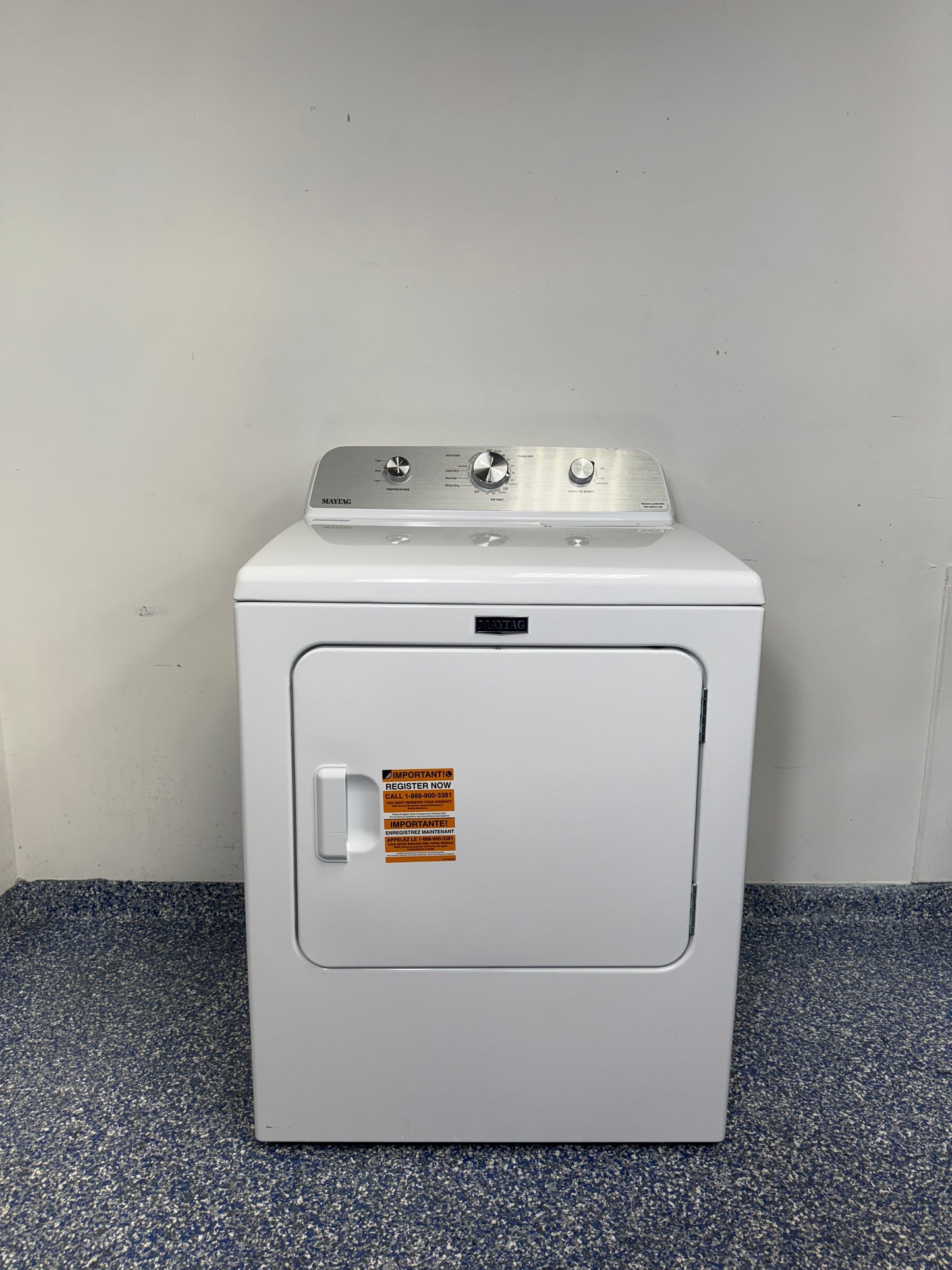 A full frontal image of the MAYTAG MED4500MW front-load electric dryer, highlighting its classic white finish and control panel. On sale at Appliance Shark - Scratch & Dent store | Kansas City.
