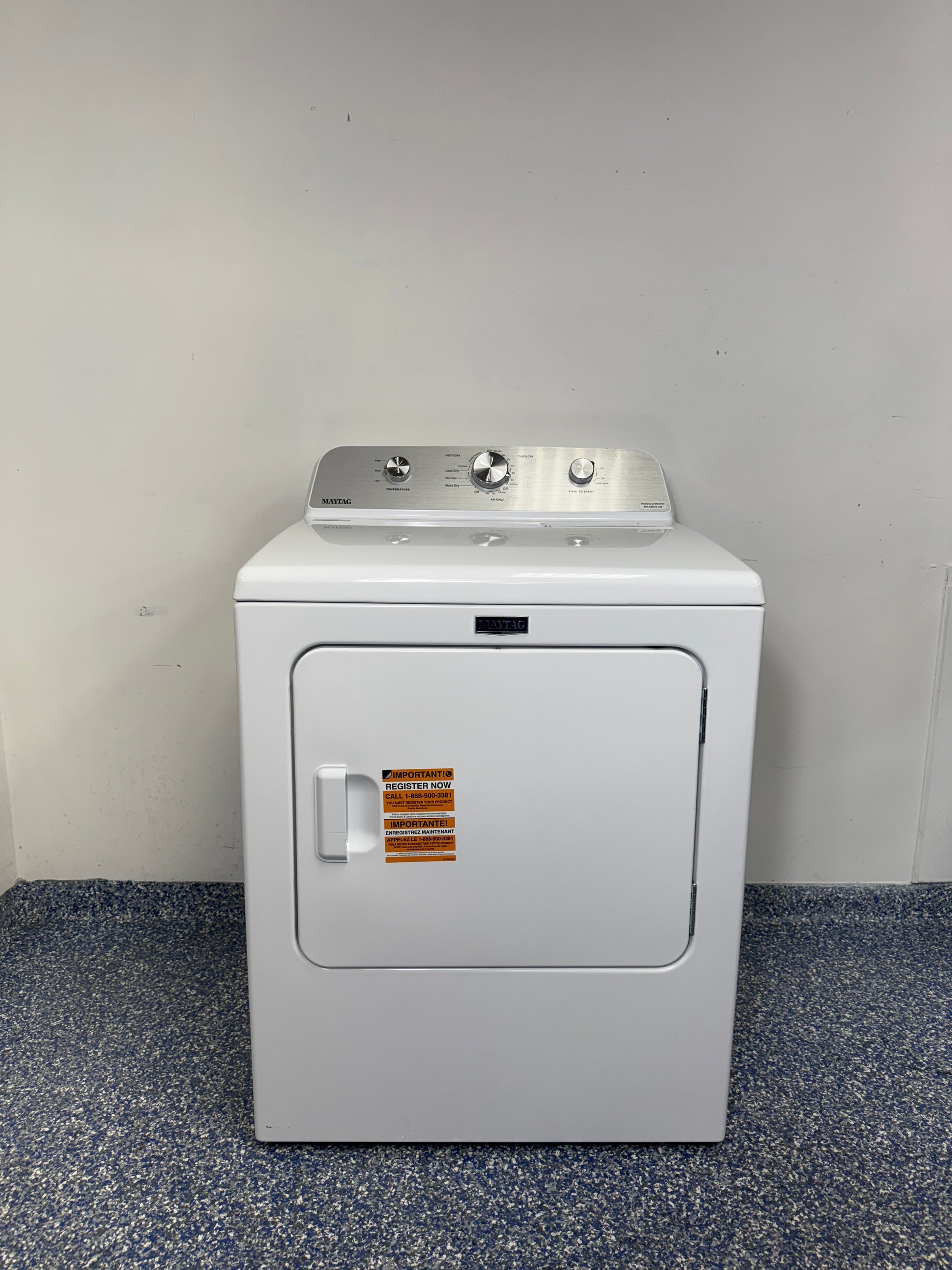 A full frontal image of the MAYTAG MED4500MW front-load electric dryer, highlighting its classic white finish and control panel. On sale at Appliance Shark - Scratch & Dent store | Kansas City.