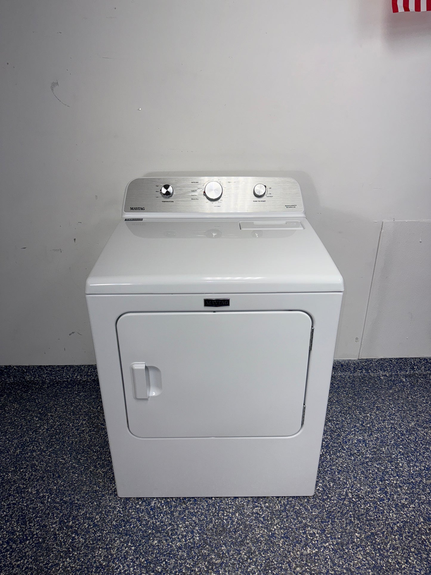 Front view of the MAYTAG MED4500MW electric dryer in a Kansas City laundry room.